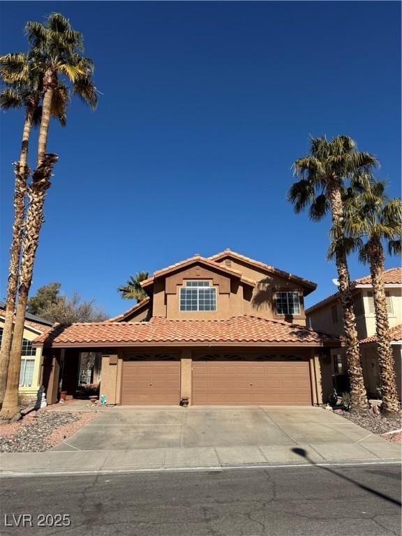 view of front of property with a garage