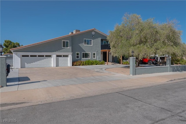 view of front of property featuring a garage