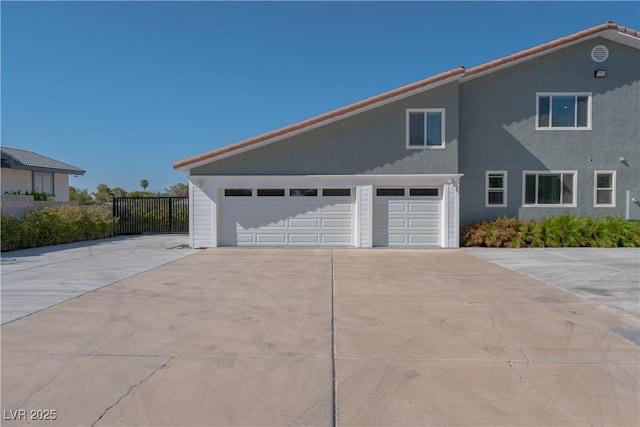 view of property exterior featuring a garage