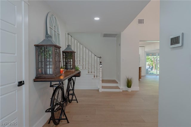 hallway featuring light hardwood / wood-style flooring