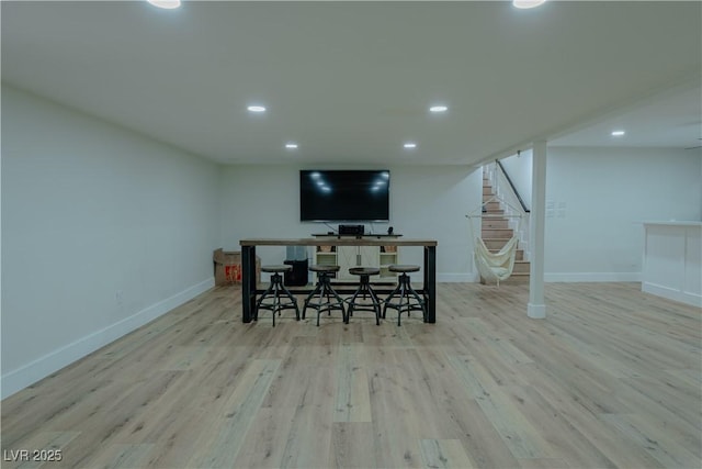 dining space with light wood-type flooring