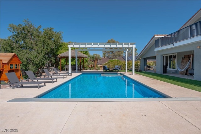 view of swimming pool with a patio area, a gazebo, and a pergola