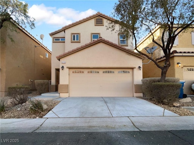 view of front of property with a garage