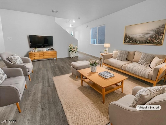 living room with dark wood-type flooring