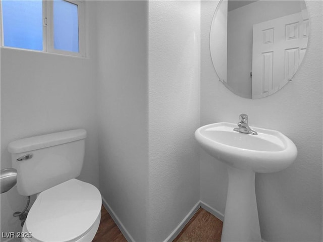 bathroom featuring toilet