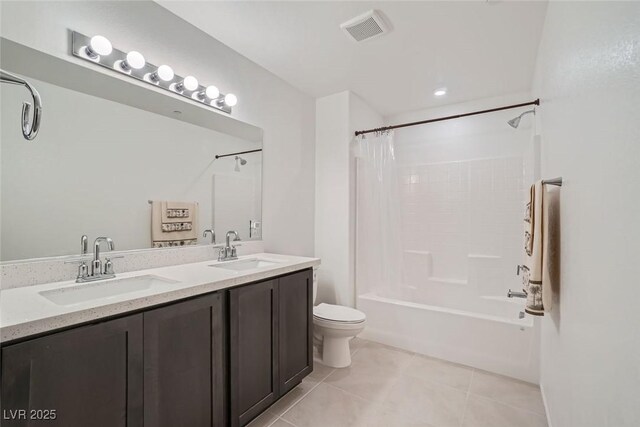 full bathroom with toilet, tile patterned flooring, vanity, and shower / tub combo with curtain