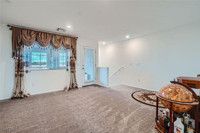 sitting room featuring carpet floors