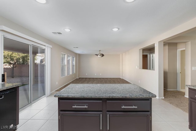 kitchen featuring dishwasher, light tile patterned flooring, visible vents, and recessed lighting