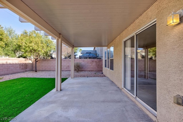 view of patio with a fenced backyard