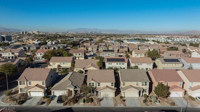 bird's eye view with a mountain view and a residential view