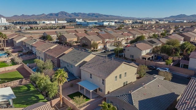 bird's eye view with a residential view and a mountain view