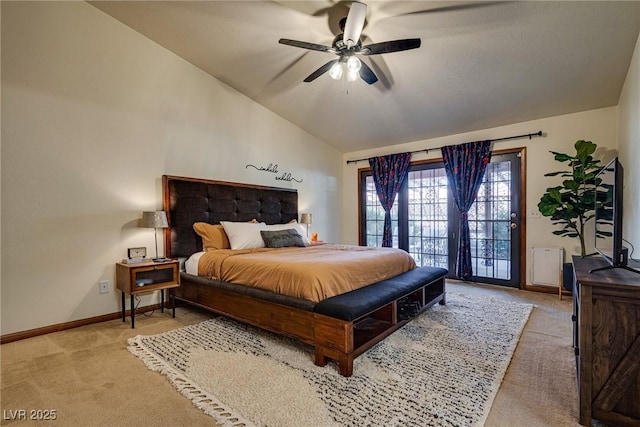 bedroom with ceiling fan, light colored carpet, and lofted ceiling