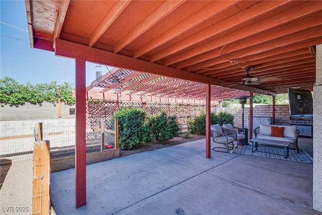 view of patio / terrace with an outdoor living space, grilling area, and ceiling fan