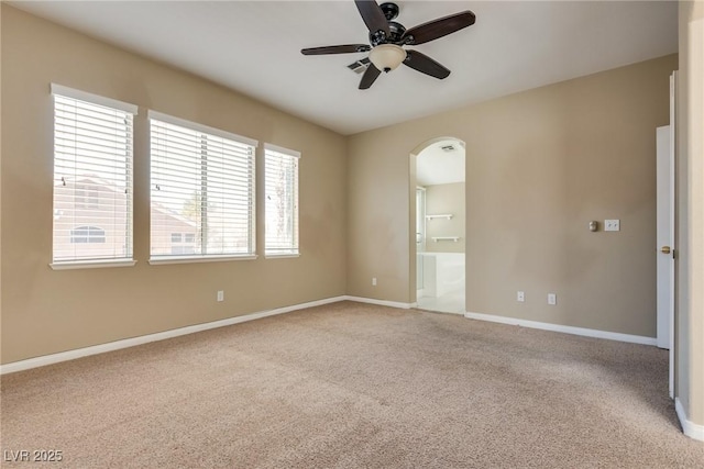 carpeted empty room with ceiling fan