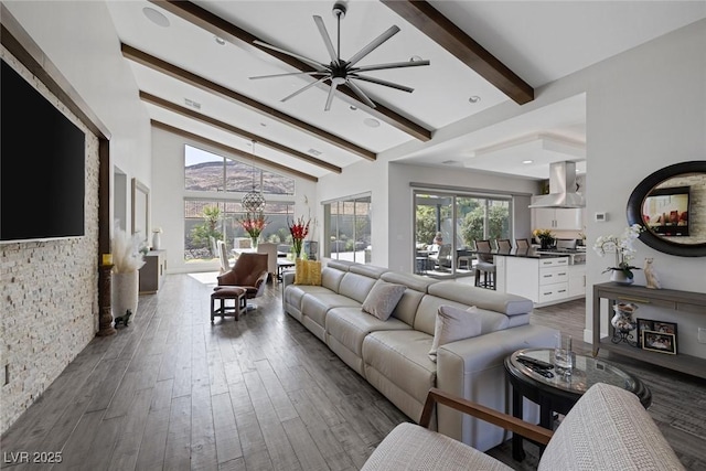 living room with high vaulted ceiling, wood-type flooring, and beamed ceiling