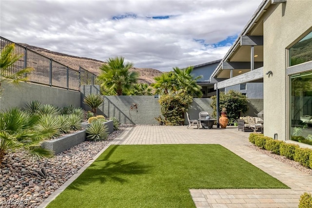 view of yard with a patio area