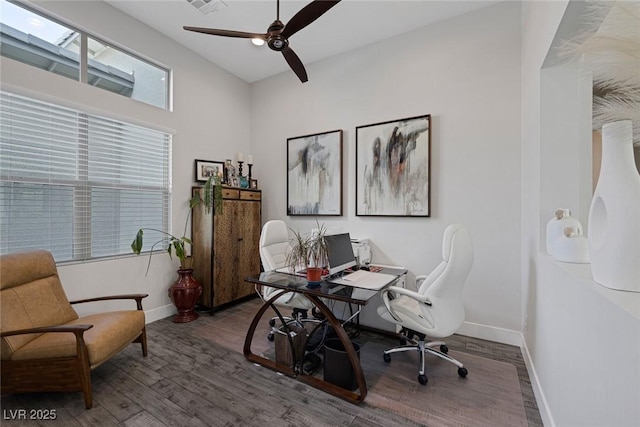 office featuring ceiling fan and dark hardwood / wood-style flooring