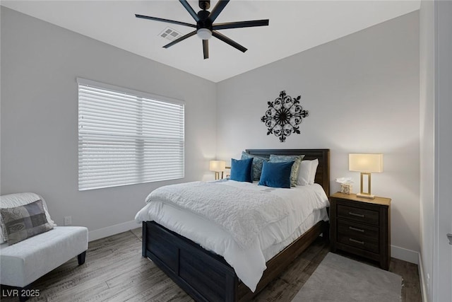 bedroom featuring ceiling fan and hardwood / wood-style floors