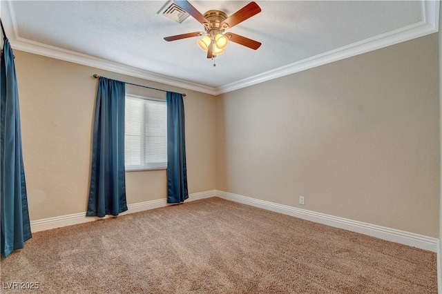 carpeted spare room with crown molding and ceiling fan