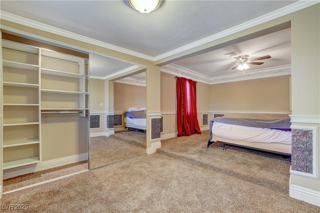 unfurnished bedroom with crown molding and carpet flooring