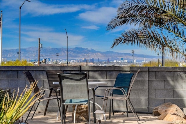 balcony with a bar and a mountain view