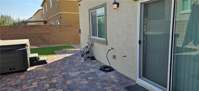 7050 Fossil Rim St, Las Vegas, NV 89084 - view of patio featuring a hot tub
