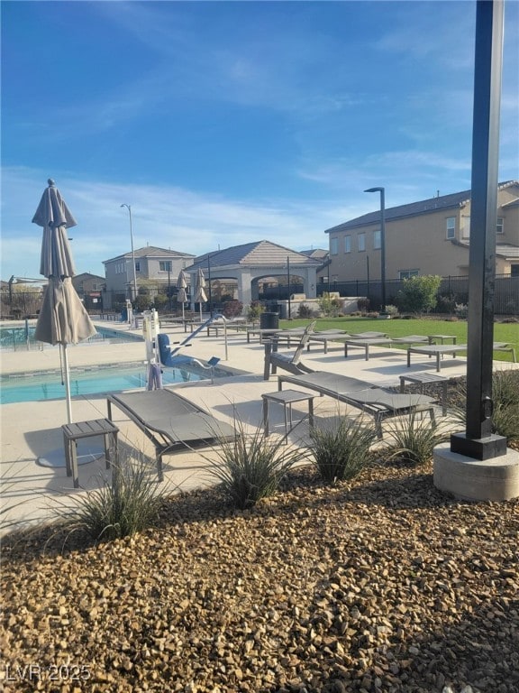 7050 Fossil Rim St, Las Vegas, NV 89084 - community pool with a residential view
