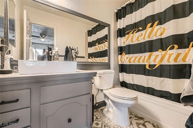 full bathroom featuring vanity, toilet, shower / bathtub combination with curtain, and tile patterned flooring