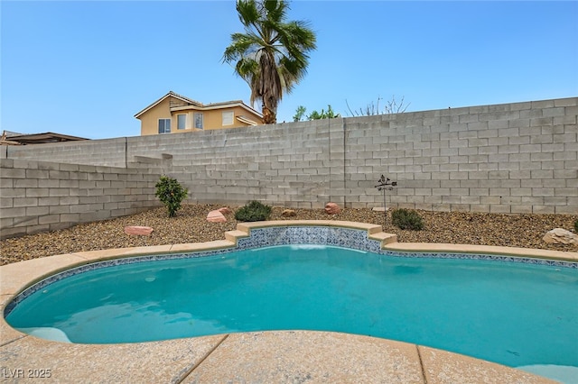 view of pool with a fenced in pool and a fenced backyard