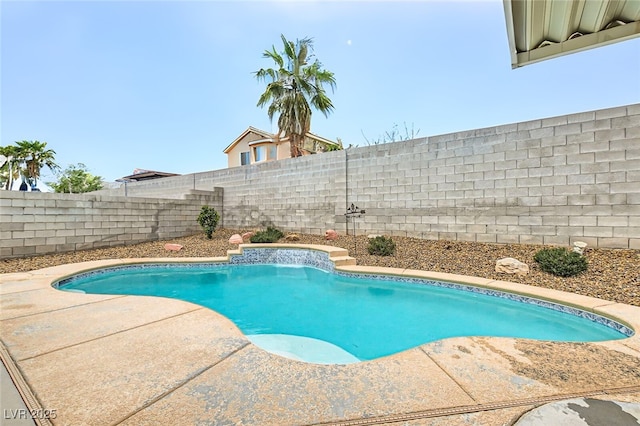 view of swimming pool featuring a patio area, a fenced backyard, and a fenced in pool