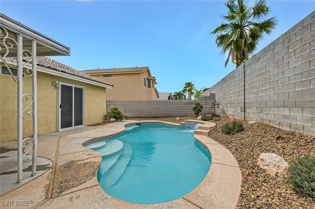 view of swimming pool with a patio, a fenced backyard, and a fenced in pool