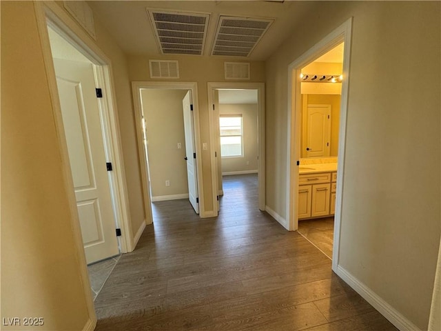 hallway featuring hardwood / wood-style floors