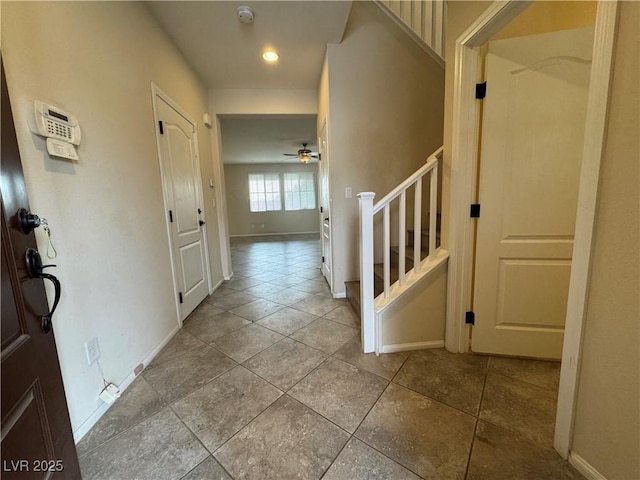 corridor featuring tile patterned flooring