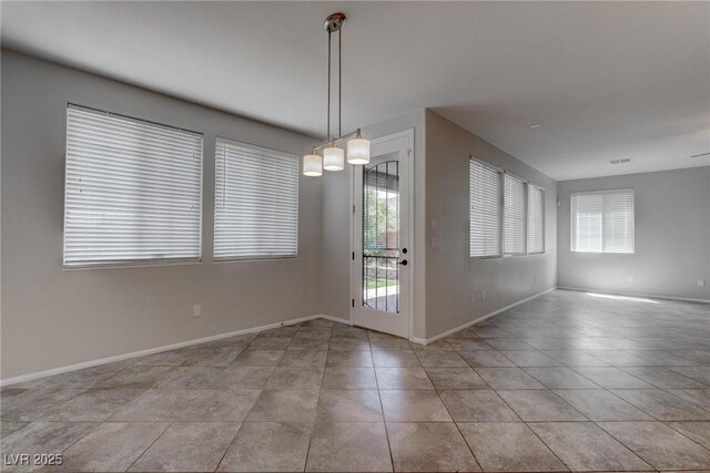 10273 Aragon Crown Rd, Las Vegas, NV 89135 - spare room with light tile patterned flooring and baseboards