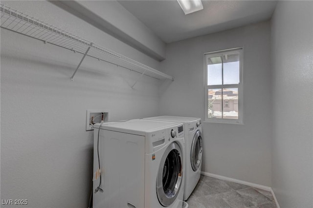 10273 Aragon Crown Rd, Las Vegas, NV 89135 - laundry area featuring independent washer and dryer, baseboards, and light tile patterned floors