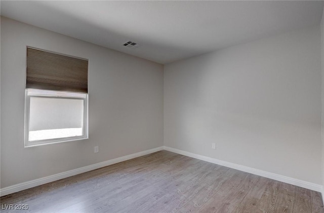 10273 Aragon Crown Rd, Las Vegas, NV 89135 - spare room featuring wood finished floors and baseboards