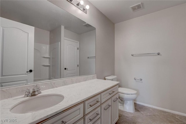 10273 Aragon Crown Rd, Las Vegas, NV 89135 - bathroom featuring baseboards, vanity, toilet, and a shower