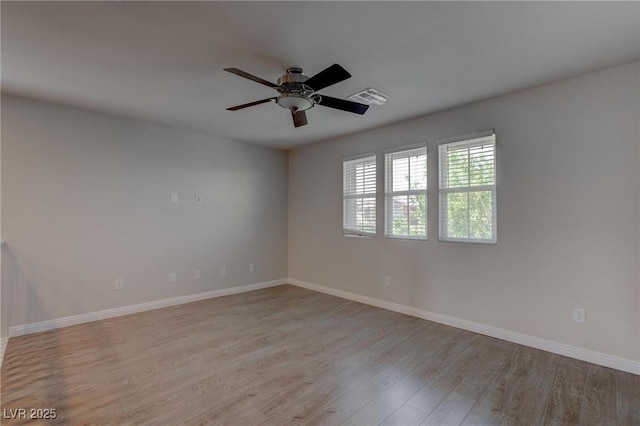 10273 Aragon Crown Rd, Las Vegas, NV 89135 - spare room with light wood-style flooring, a ceiling fan, and baseboards