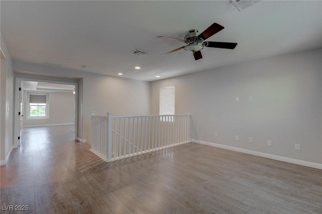 10273 Aragon Crown Rd, Las Vegas, NV 89135 - unfurnished room with ceiling fan, wood finished floors, baseboards, and recessed lighting