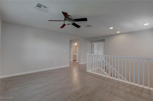 10273 Aragon Crown Rd, Las Vegas, NV 89135 - unfurnished room featuring wood finished floors, recessed lighting, ceiling fan, and baseboards