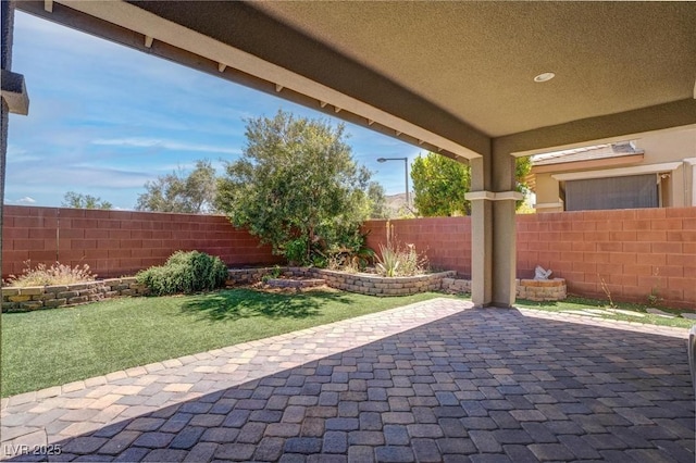 10273 Aragon Crown Rd, Las Vegas, NV 89135 - view of patio featuring a fenced backyard
