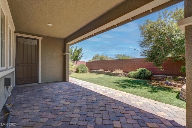 10273 Aragon Crown Rd, Las Vegas, NV 89135 - view of patio / terrace with a fenced backyard