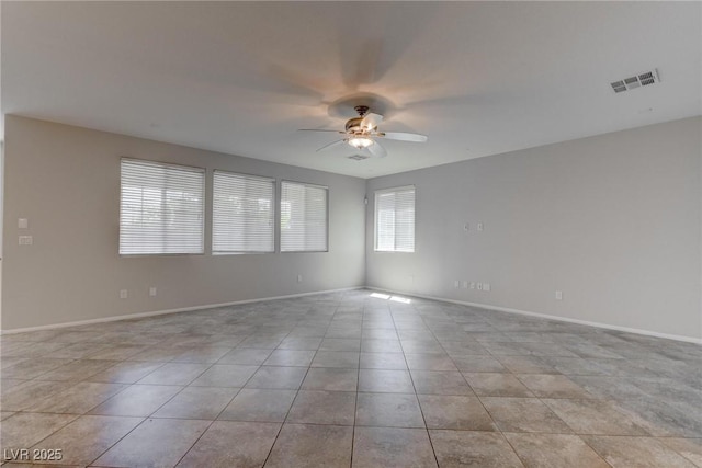 10273 Aragon Crown Rd, Las Vegas, NV 89135 - unfurnished room with a ceiling fan, tile patterned flooring, and baseboards