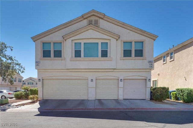 view of front of property featuring a garage