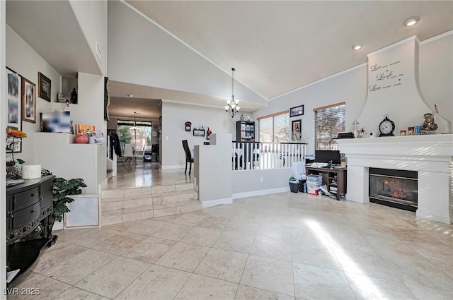 living room featuring high vaulted ceiling and an inviting chandelier