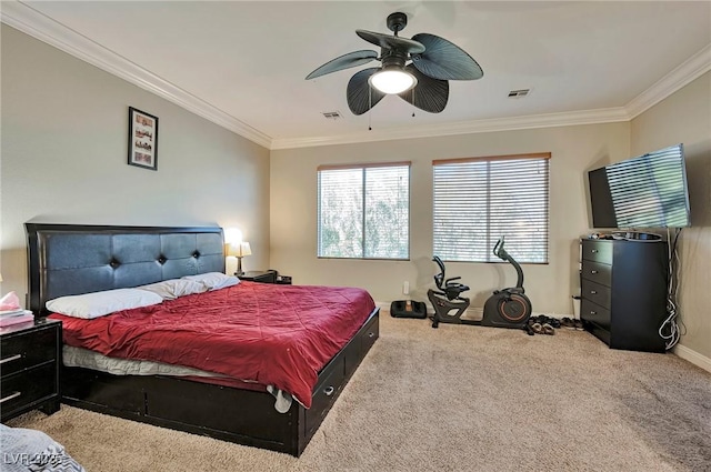 bedroom featuring ornamental molding, carpet, and ceiling fan