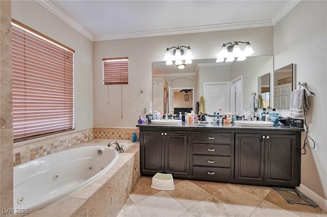 bathroom with tile patterned flooring, crown molding, tiled bath, and vanity