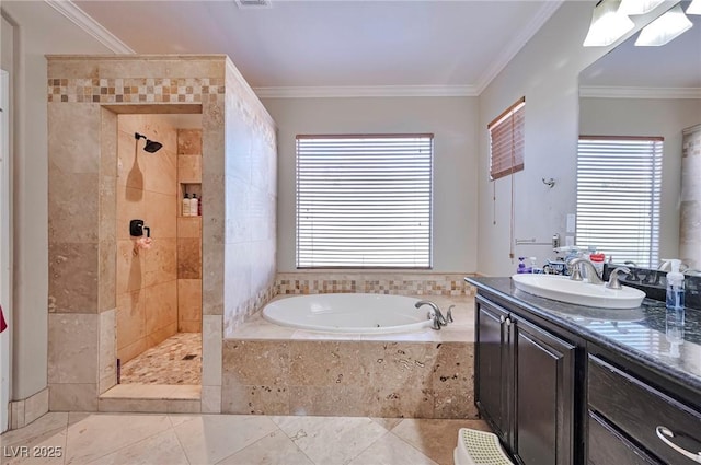 bathroom with vanity, tile patterned flooring, crown molding, and shower with separate bathtub