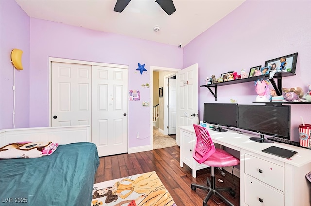 home office featuring dark hardwood / wood-style floors and ceiling fan