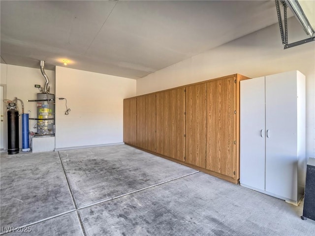 garage featuring water heater